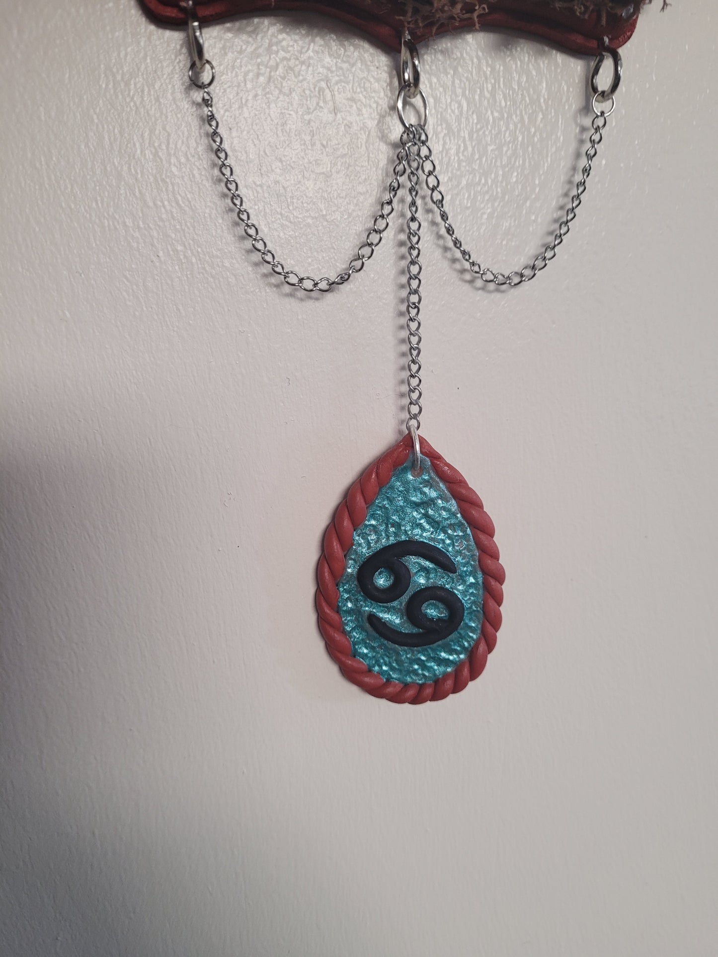 Cancer Rhodonite crystal astrology wall hanging